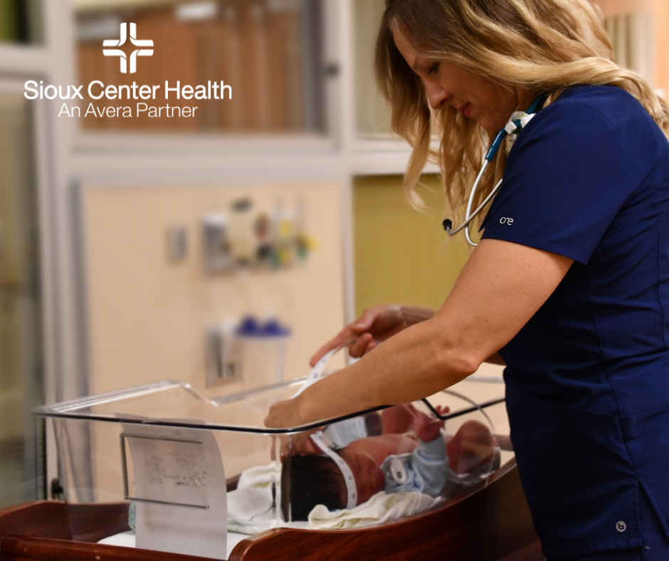 Nurse attending a newborn baby