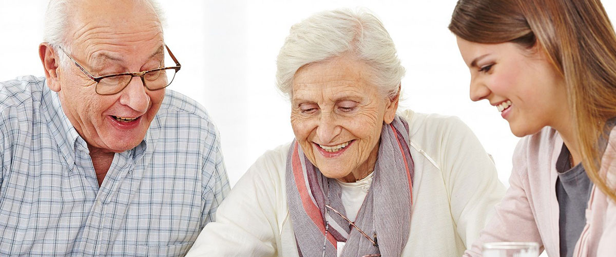 Elderly Couple With Caregiver | Assisted Living Memory Care