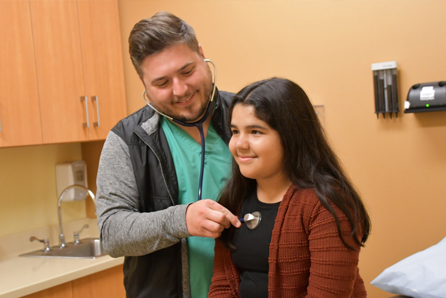Child getting physical exam for sports at Sioux Center Health