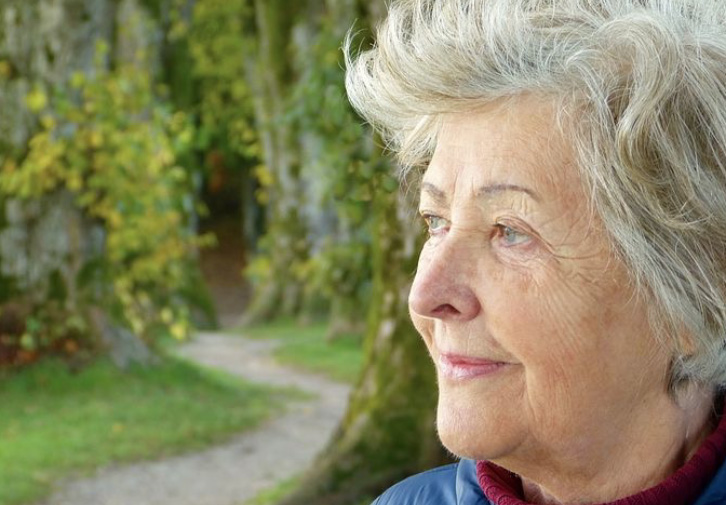 healthy elderly woman enjoying the outside
